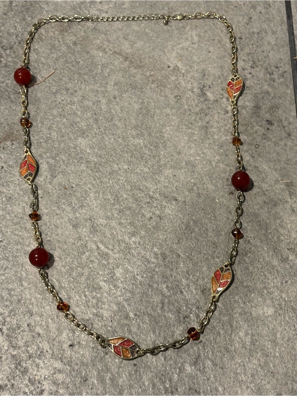 Vintage Gold-Tone Necklace with Red Beads and Enamel Leaf Details